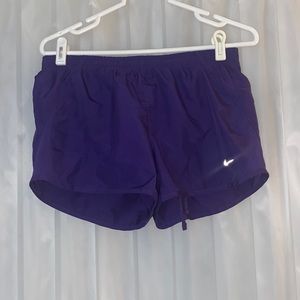 NIKE purple running shorts